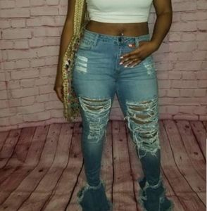 Distressed denim jeans